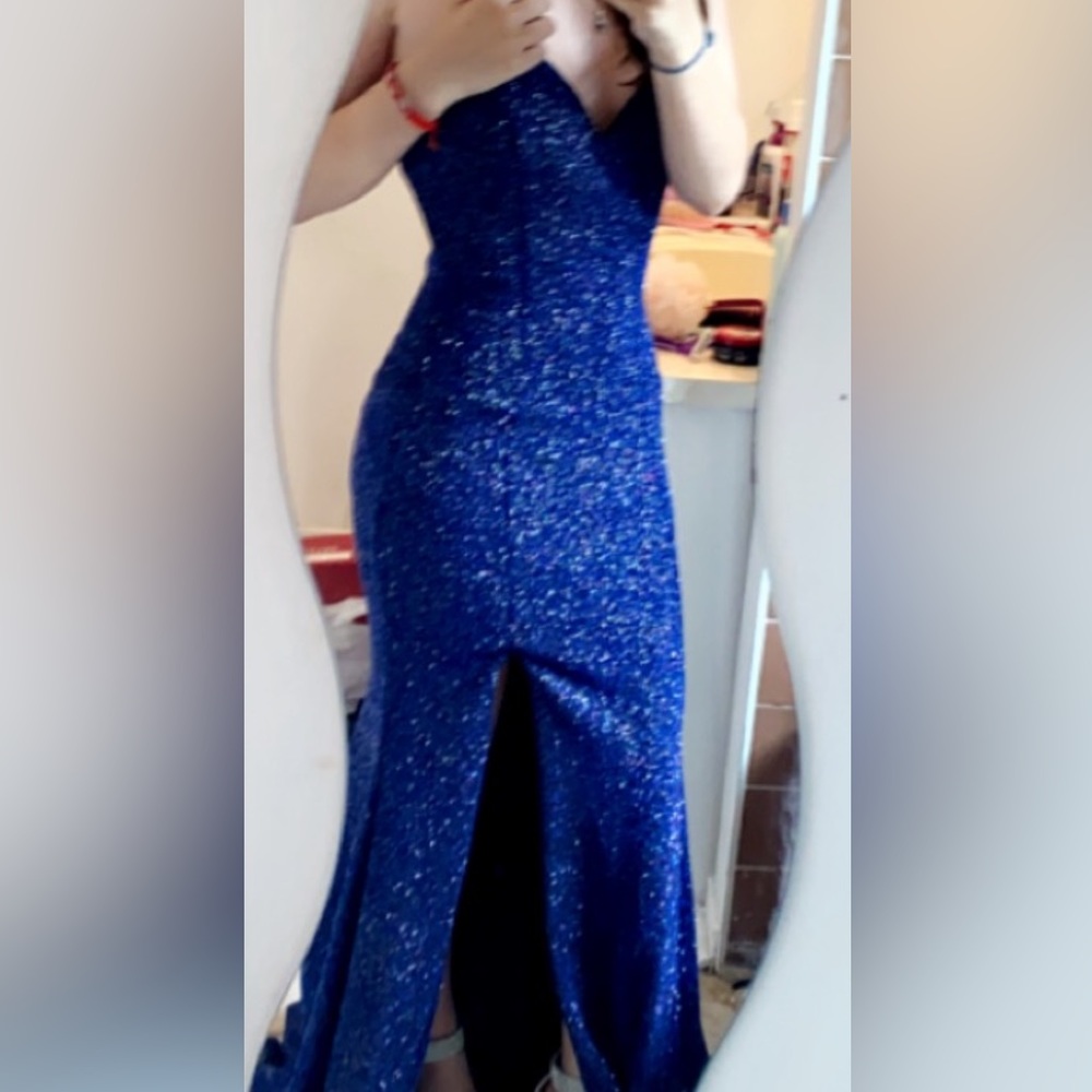sparkly blue fitted dress with slit